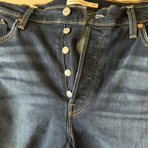 Levi’s button fly distressed jeans